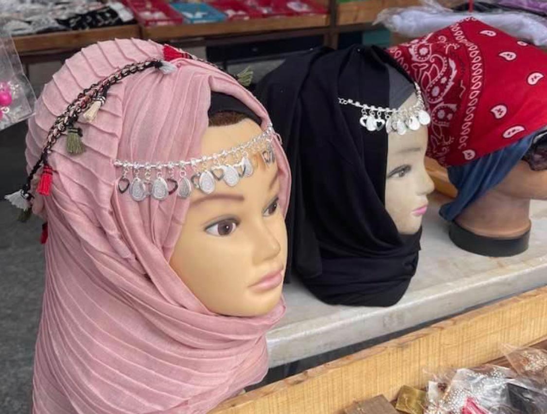Hand draping a luxury hijab